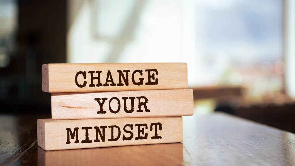 Wooden blocks with words 'Change Your Mindset'